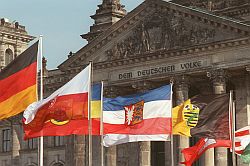 The flags of the Länder and the Federation flying outside the Reichstag Building