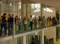 Photography: A Group of Visitors in the Reichstag Building, passing the plenary chamber