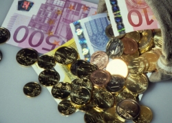 Foto: Kleingeld und 500-Euro-Schein