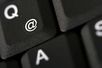 @-Zeichen auf einer schwarzen Tastatur