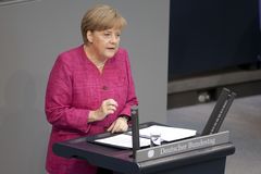 Dr. Angela Merkel