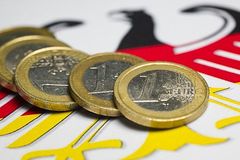 Bundesadler und Euromünzen