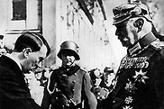 Chancellor Adolf Hitler greets Paul von Hindenburg