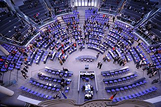 The plenary chamber of the German Bundestag from above: the seats are arranged by parliamentary group