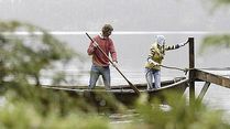 Mann und Frau in einem Boot