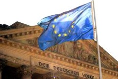 The European Union flag in front of the Reichstag Building in Berlin