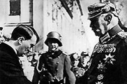 Chancellor Adolf Hitler greets Paul von Hindenburg