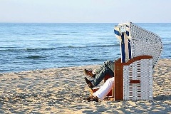 Touristen im Strandkorb