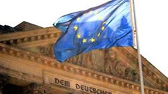 The European Union flag in front of the Reichstag Building in Berlin