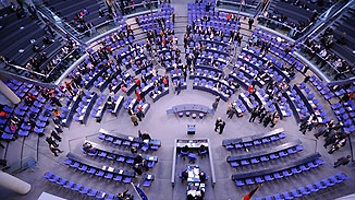 The plenary chamber of the German Bundestag from above: the seats are arranged by parliamentary group