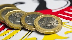 Bundesadler und Euromünzen